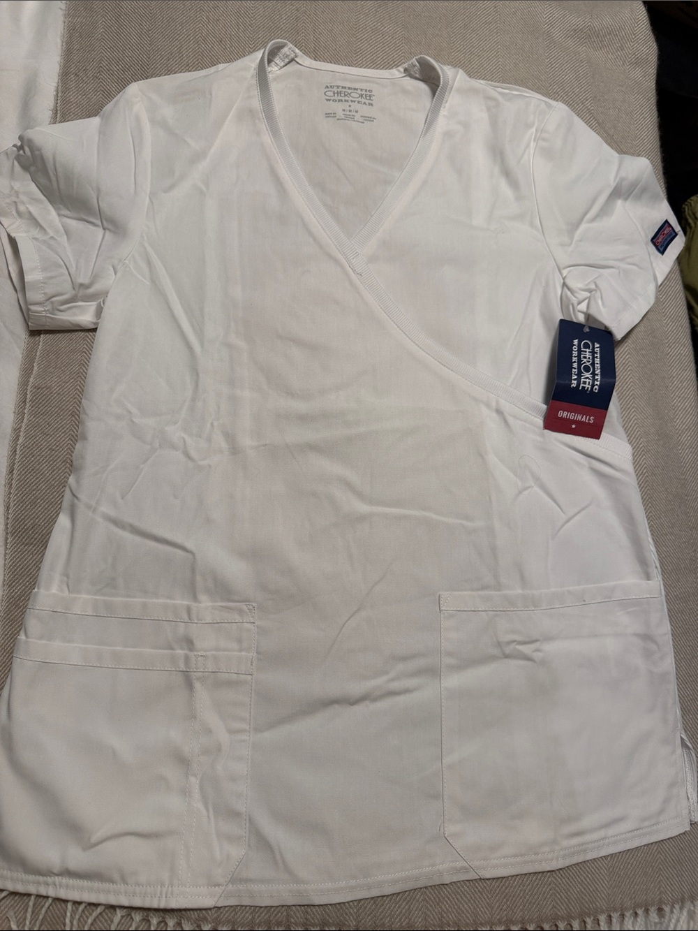 Cherokee women’s White Short Sleeve V-Neck Scrub Top